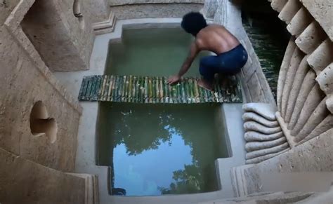 Survivalist YouTuber builds underground pool using only natural .